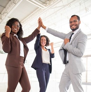 happy business team celebrating success